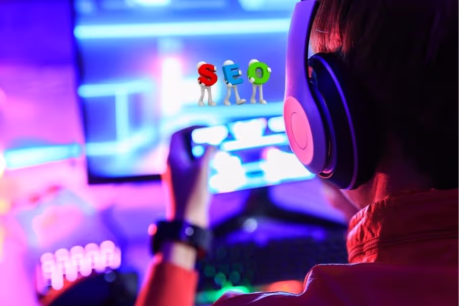 Gamer wearing headphones playing on a screen with SEO letters displayed